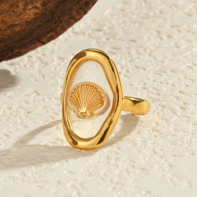 Bague Coquillage Chic sur fond beige