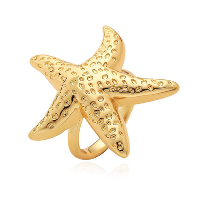 Bague Coquillage Etoile de Mer Dorée sur fond blanc