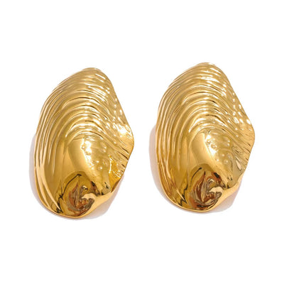 Boucle d’Oreille Coquillage Design Chic sur fond blanc