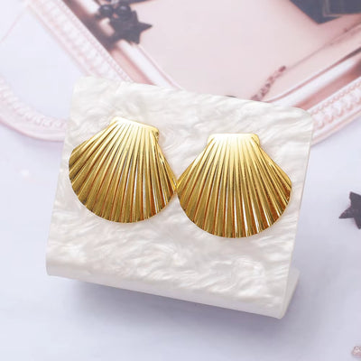 Boucle d’Oreille Coquillage Raffinée